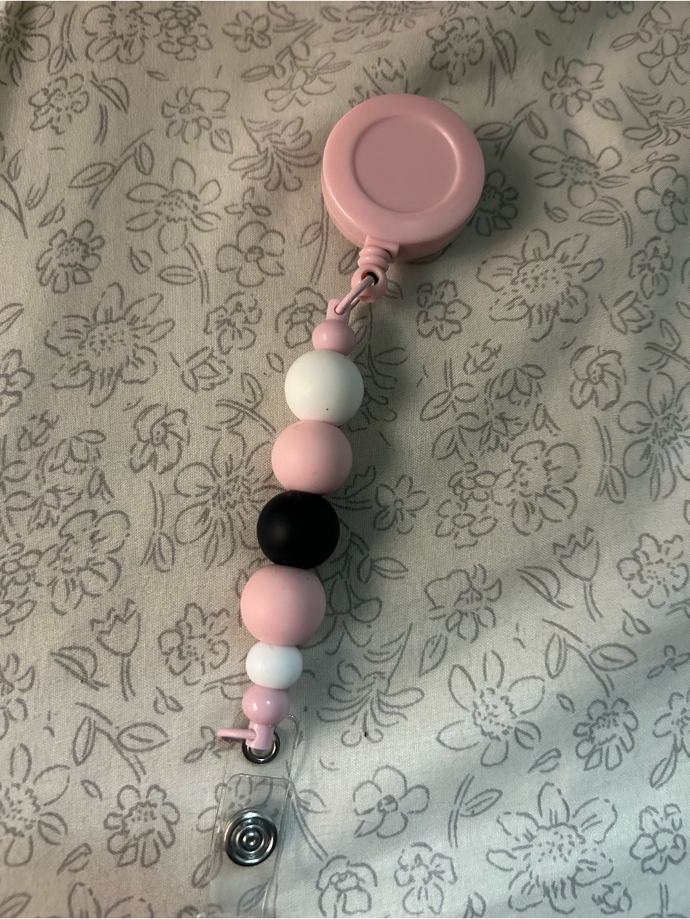 Pink, black, and white badge reel ✨
